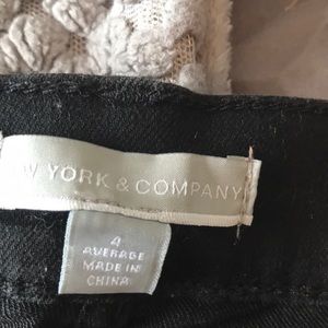 Boot cut, stretchy, black , 5 pocket, size 4.